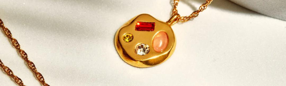 Captivating Brilliance: Unveiling the Magic of Gold Crystal Necklaces